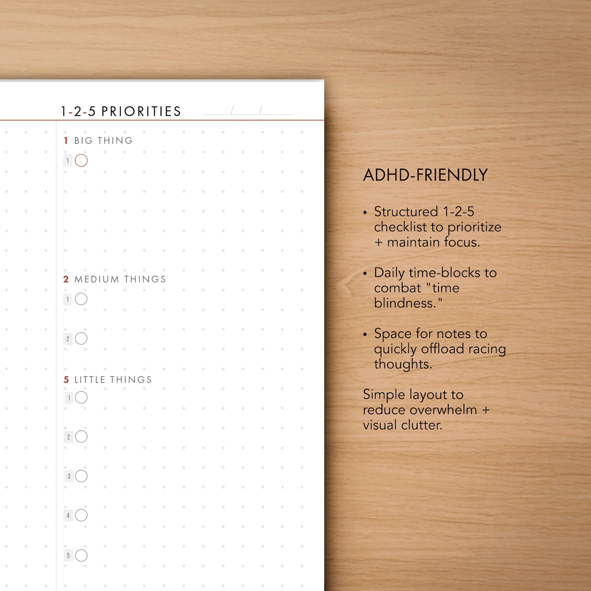 Checklist titled '1-2-5 Priorities' on a wooden surface with text describing its features.
