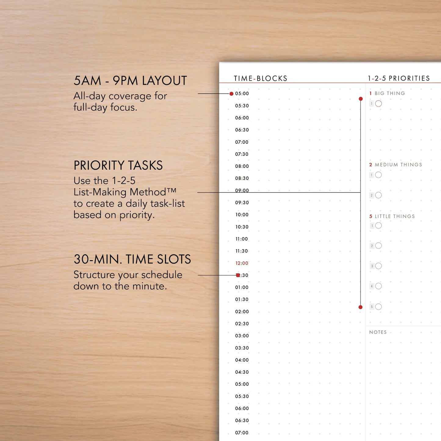 Schedule planner with time blocks and priority tasks on a wooden surface